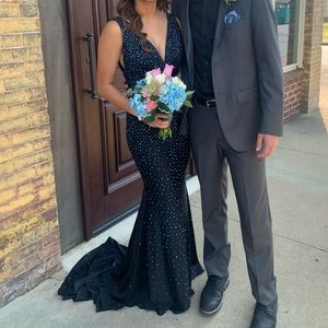 Gorgeous Johnathan Kayne black dress with small train size 2.